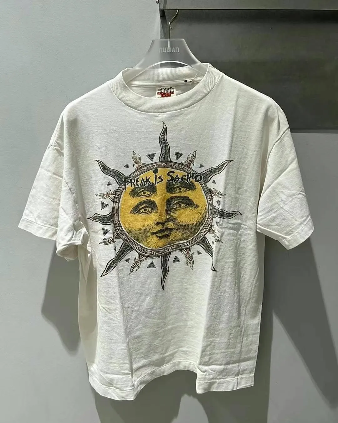 CACTUS PLANT FLEA MARKET x SAINT Mxxxxxx SUN SS TEE/WHT CPFM joint model Four-eye sun printed short sleeves Off-white S-XL Cylindrical fabric without side seams 220g high weight OE yarn ⚠️Note: It is almost meaningless if it is not a cylindrical fabric Customized CPFM joint main mark/wash mark/little angel anti-counterfeiting label Original-level printing factory Top purchasing level